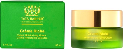 A green box and jar of Tata Harper Creme Riche Velvet Moisturizing Cream with gold lid.