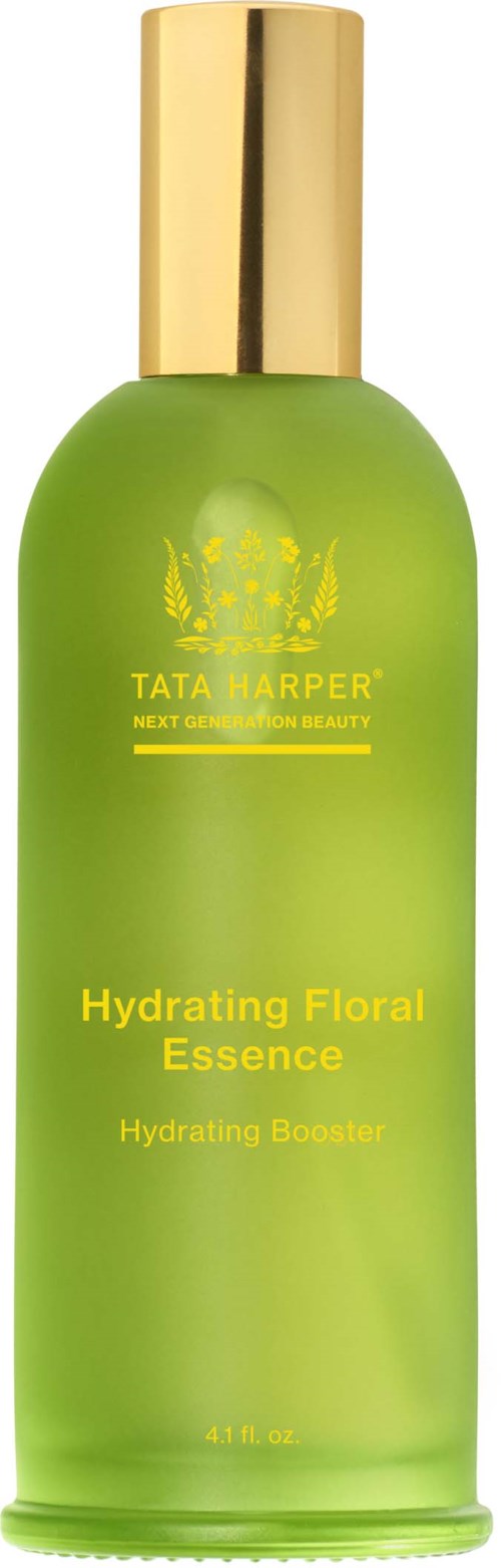 Vihreä pullo merkitty Tata Harper Hydrating Floral Essence, kosteuttava kasvosuihke kultaleikkauksella.