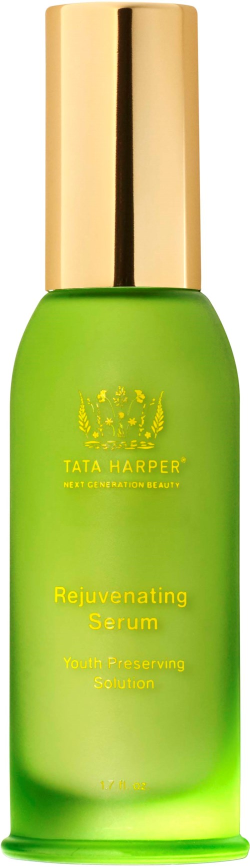 En grön flaska med guldlock, märkt Tata Harper Rejuvenating Serum, för ungdomsvård.