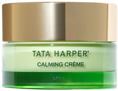 A green jar of Tata Harper calming cream with a gold lid.