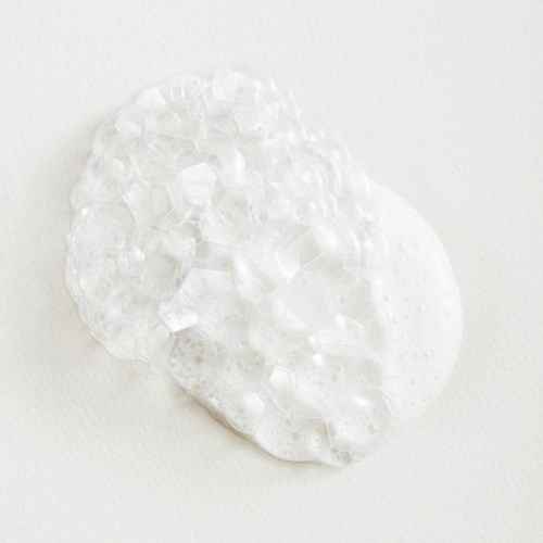 A clear, abstract gel-like or bubble-like shape on a white background.