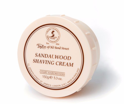 Een ronde container met sandalwood scheercrème van Taylor of Old Bond Street.