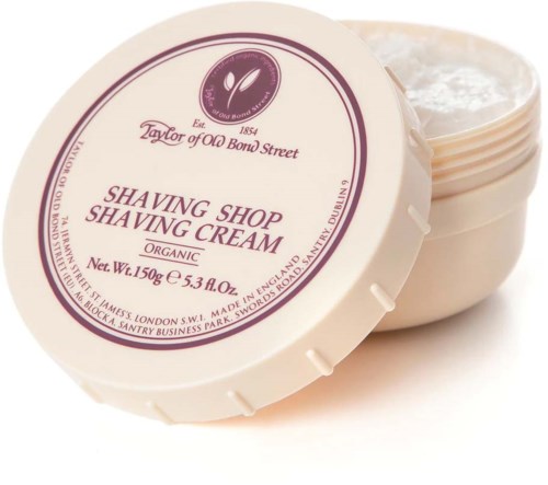 En rund beholder med lokk, merket 'Shaving Shop Shaving Cream,' fylt med krem, økologisk, 150g.