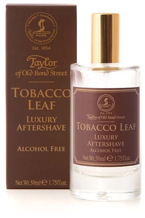 En flaska av tobakksblad lyx aftershave med guldkapsel och brunt boxmärke.