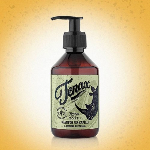 Eine braune Flasche mit Pumpeetikett, steht "Tena" und zeigt einen Walschädel, mit beige-grünem Hintergrund.