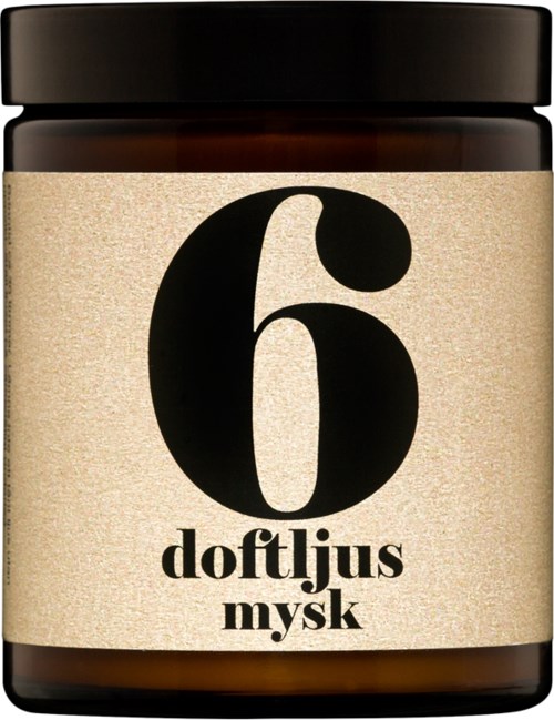 Ett brunt burk med en beige etikett. Etiketten har en stor svart siffra 6 och små ord under.