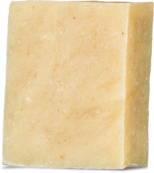 En beige såpe med glatt overflate og litt ru kanter, rektangulær form.