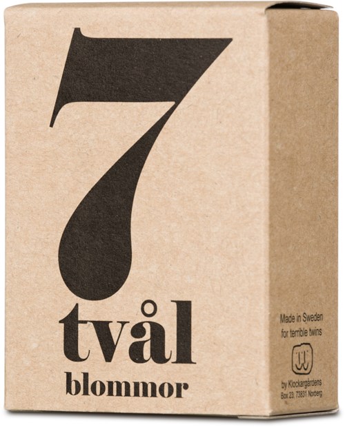 En kartonglåda med stor svart siffra 7 och orden "tålv blommor" på.