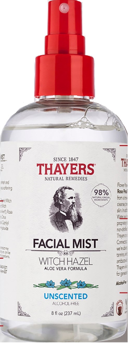 A clear spray bottle with a red cap, labeled Thayers facial mist with witch hazel and aloe vera.