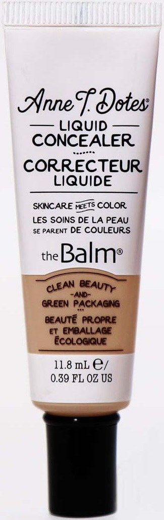 En hvid tube med Concealer med sort tekst, mærket som Anne F. Dotes, og nævner hudpleje og miljøvenlig emballage.
