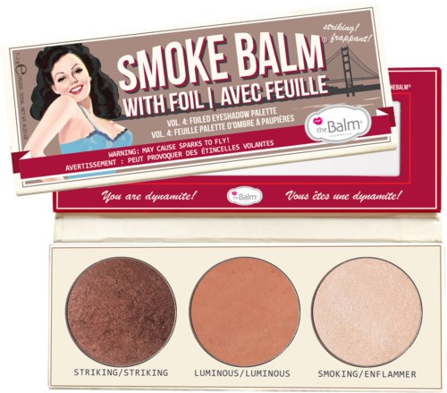 En sminkpalett med tre nyanser: brunt, orange och ljusbeige, avsedd för ögonmakeup med foileffekter.