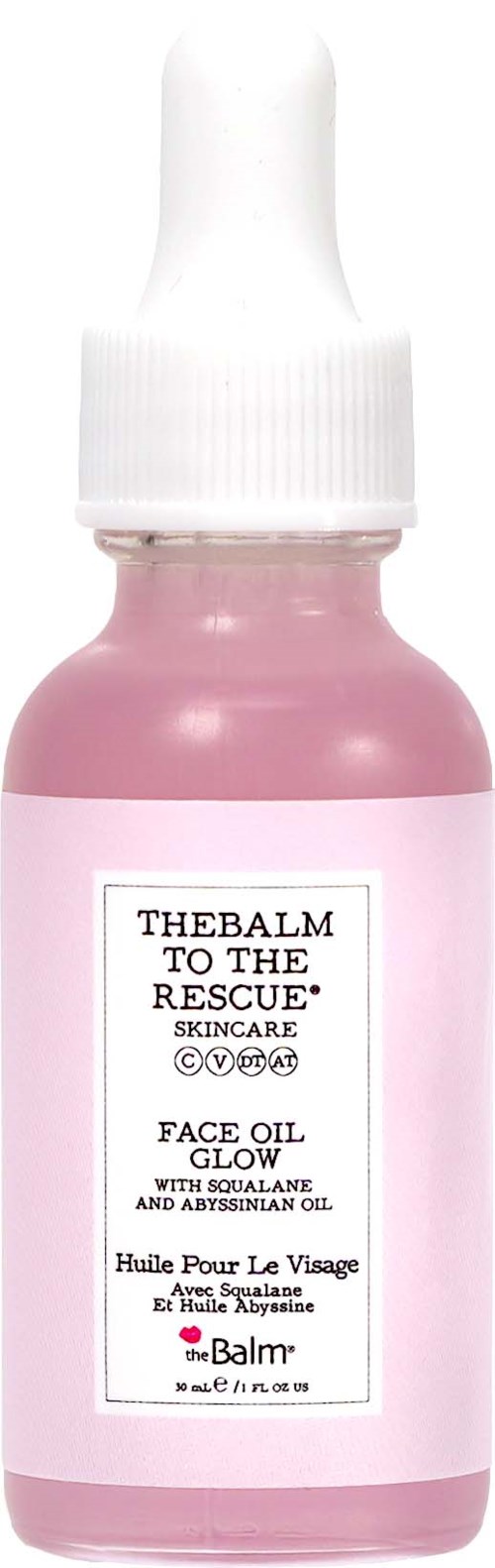 Lys rosa ansiktsolje i flaske med hvit pipette, merket 'TheBalm to the Rescue' for ansiktet.