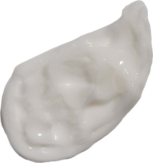 En hvid, skinnende, uregelmessig formet genstand, der ligner en dumpling eller blød mad.
