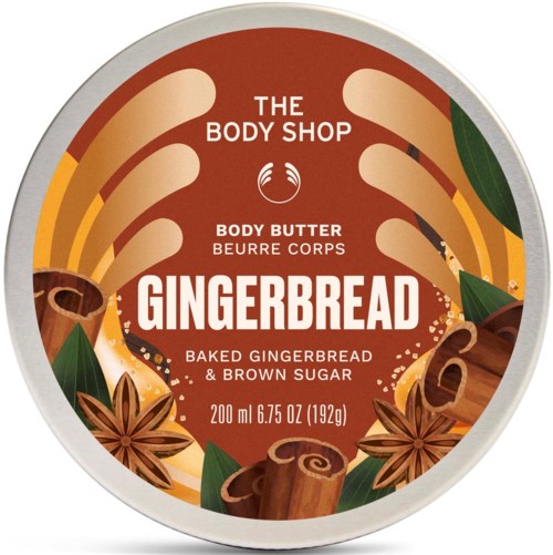 Body butter-beholder med illustrasjoner av pepperkake og stjerneanis, merket med duft og produktdetaljer.
