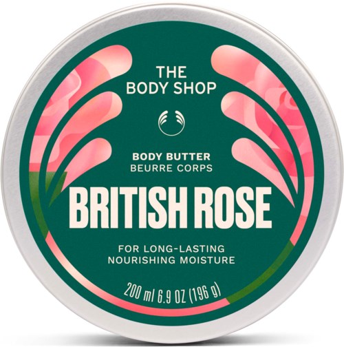 En rund beholder med The Body Shop British Rose kroppsmør med rosa roser og grønn bakgrunn.