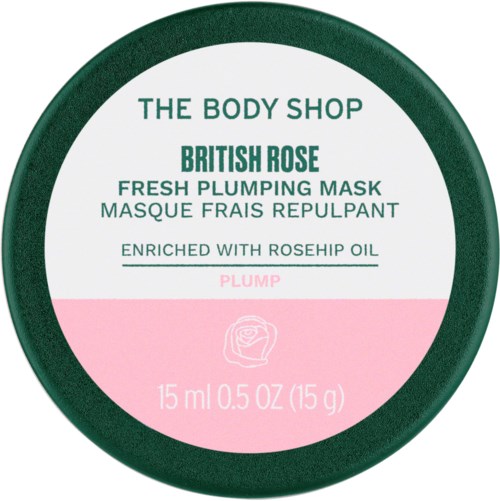 En rund mærkat med grøn, pink og hvid sektion, der reklamerer en roseduftende ansigtsmaske fra The Body Shop.