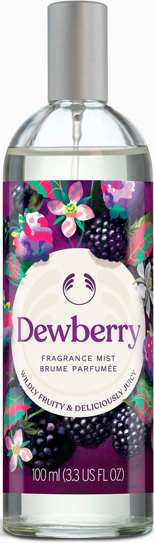 En sprayflaska märkt Dewberry doftmist med björnbär och blommor på lila bakgrund.