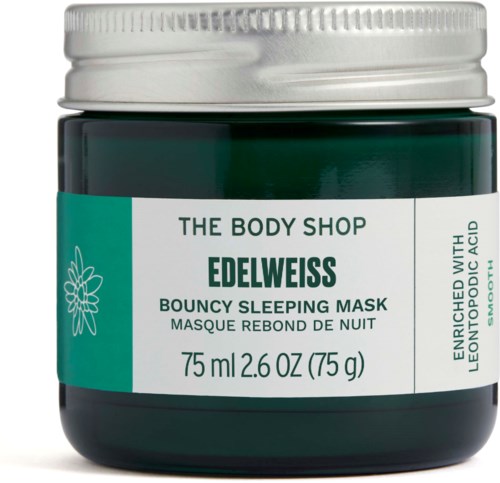 En burk av The Body Shop Edelweiss Bouncy Sleeping Mask med grön och vit etikett.