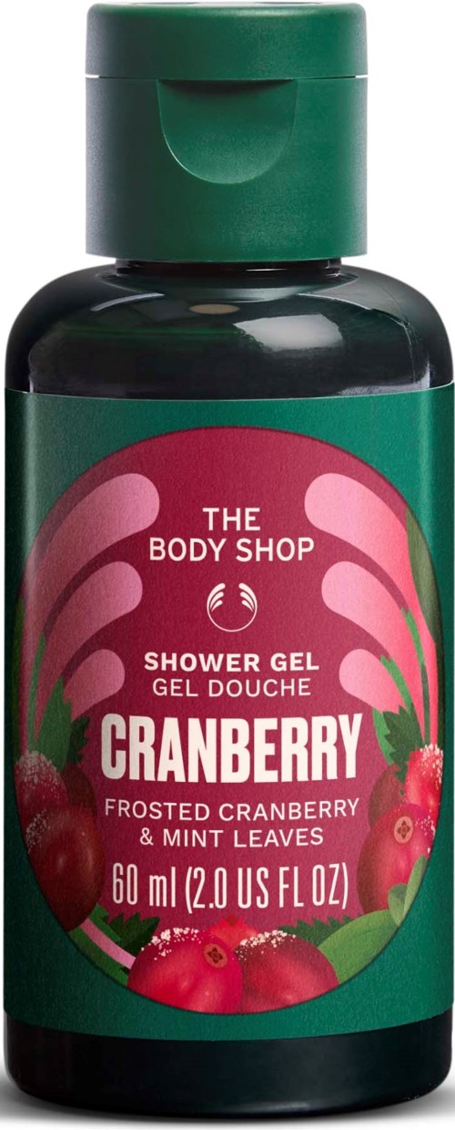 En grön flaska med The Body Shop's tranbärs shower gel, med en rosa och röd etikett som visar tranbär och myntablad.