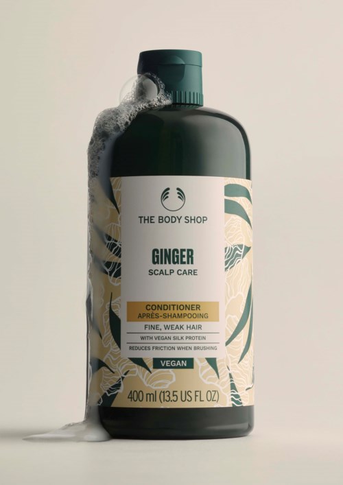 The Body Shopin inkiväärinen päänahkahoitohoitoaine, jossa vaahtoa päällä, sisältää 400 ml.
