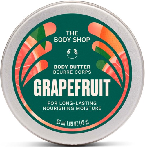 Rund kroppssmørbeholder med grønt etikett, med appelsin- og rosa grapefruktillustrasjoner og hvit tekst.