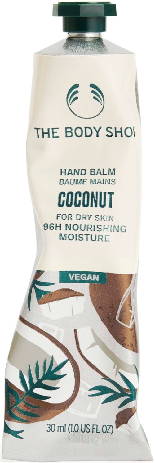 En kokosdoftande handbalsam i ett skrynkligt rör, märkt som veganskt, för torr hud, ger närande fukt och har tropiska bladdesigner.
