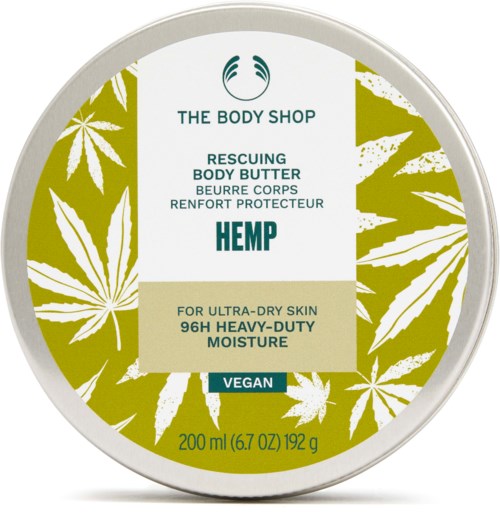 Body butter beholder med hampamutert bladmønster og etikett som angir at den er vegansk, fuktighetsgivende for tørr hud.