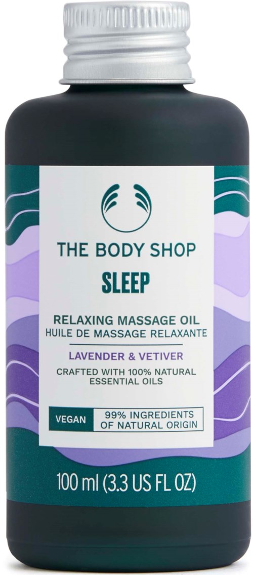 En flaska av The Body Shop Sleep Relaxing Massage Oil, doft av lavendel och vetiver, naturliga ingredienser, 100ml.