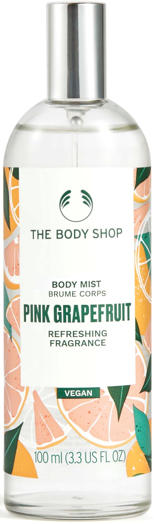 En tydlig kroppssprayflaska med en färgglad design av rosa grapefrukter och silverlock. Den är från The Body Shop.