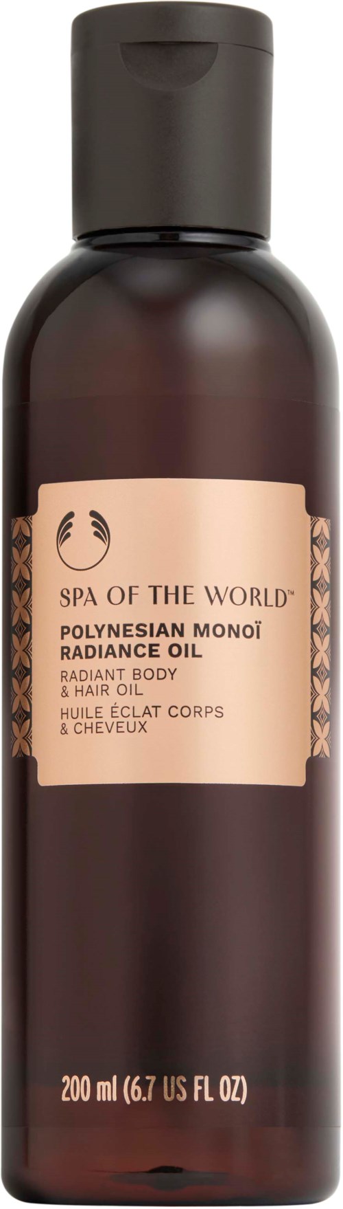 Ruskea pullo Polynesian Monoi Radiance Oil -tuotteelle keholle ja hiuksille. Siinä on vaaleanpunainen etiketti ja musta korkki.