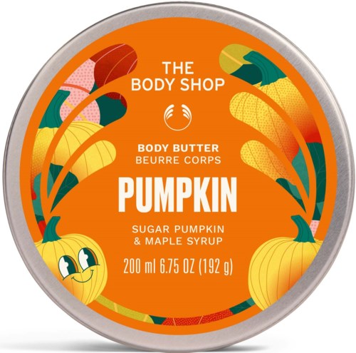 Rundt kroppssmør-beholder med pumpkin-inspirerte bilder, oransje etikett og tekst om smak og ingredienser.