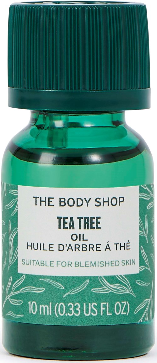 Mała zielona butelka oleju z drzewa herbacianego do skóry skłonnej do niedoskonałości od The Body Shop. Nadaje się do skóry, 10 ml.