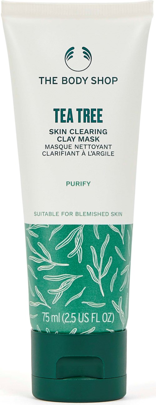 A white tube of skin clay mask with green leaves design, labeled as Tea Tree Skin Clearing. Suitable for blemished skin.