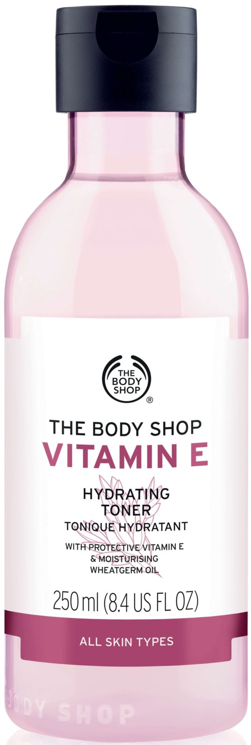 En rosa flaska av The Body Shop Vitamin E återfuktande toner för alla hudtyper med skyddande vitamin och vetegroddsolja.