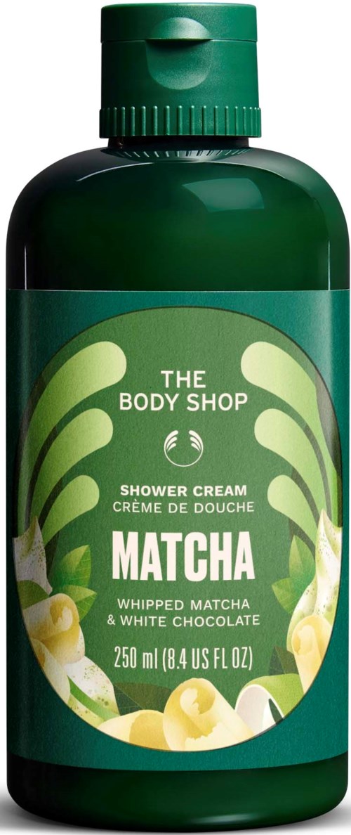 Grön flaska av The Body Shop Matcha duschkräm med vit och grön etikett med växtdesign och produktdetaljer.
