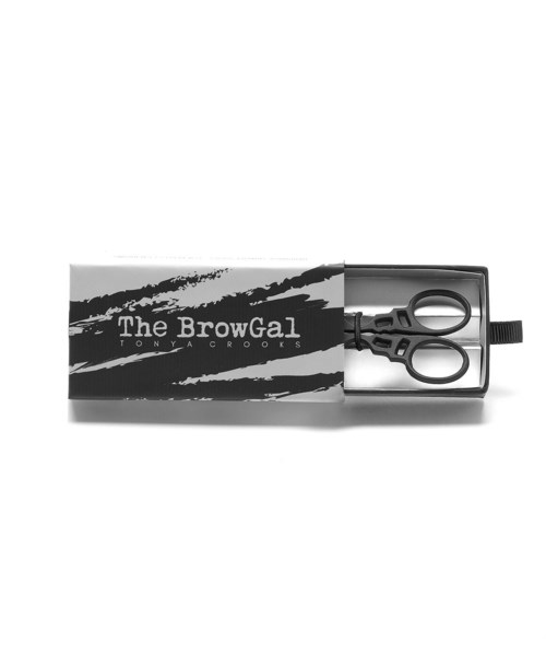 A black grooming scissors inside a box labeled 'The BrowGal' by Tony Crooks.