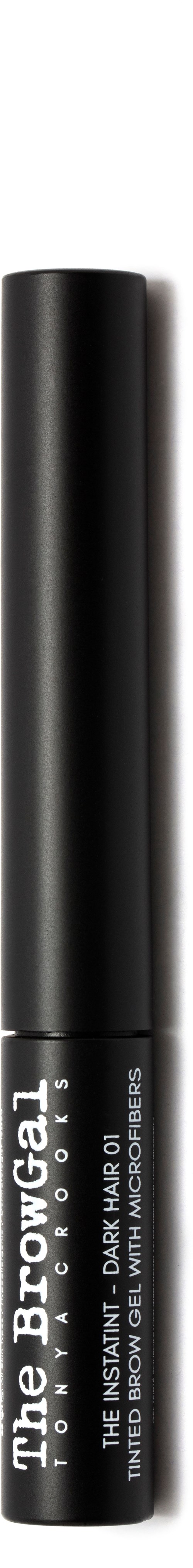 En svart makeup-produkt rør med hvit tekst, står mot en svart bakgrunn.
