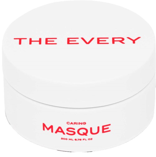 En vit behållare med röd text som säger 'THE EVERY' och 'CARING MASQUE', vilket antyder en hudvårdsprodukt.