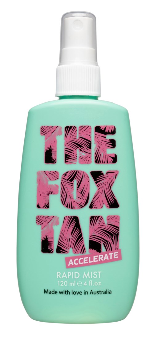A bottle of The Fox Tan Accelerate Rapid Mist with pink and black lettering and a white spray cap.
