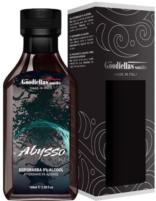 Brązowa butelka i czarne opakowanie z białymi i turkusowymi wzorami, etykieta mówi 'Abyss' i '0% alkoholu', produkowane we Włoszech.