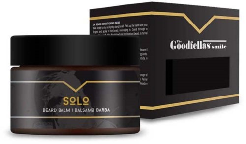 En skäggvårdsprodukt i en svart burk med matchande förpackning, märkt 'Solo' och 'Beard Balm.'