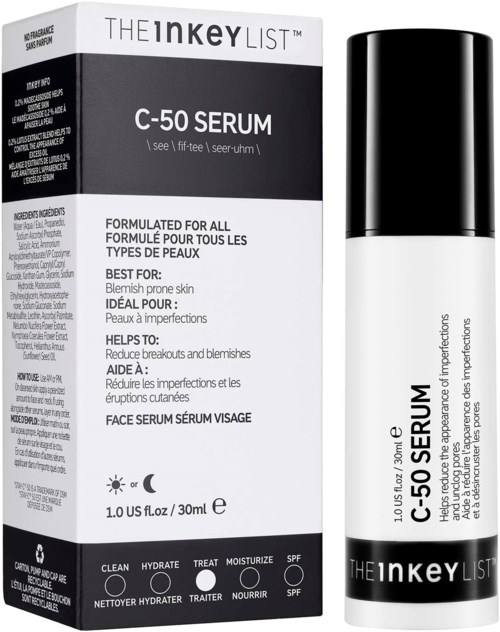Ihonhoitotuotteiden laatikko ja musta pullo, jossa lukee C-50 Serum, yksinkertainen mustavalkoinen muotoilu.