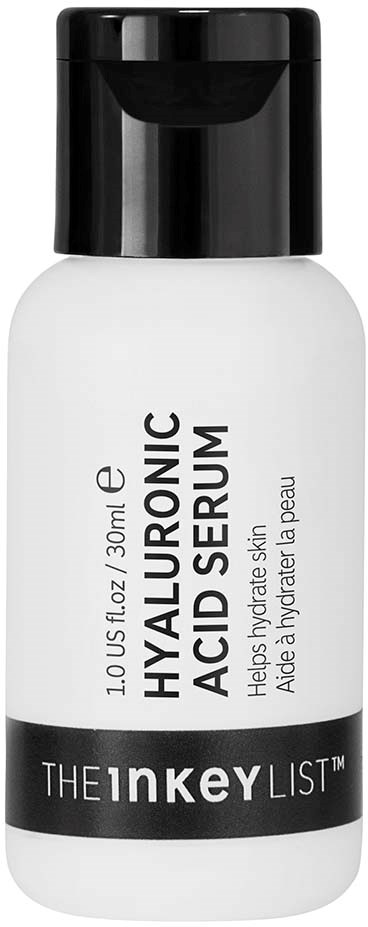 Valkoinen pullo, jossa on musta korkki, ja etiketti 'Hyaluronic Acid Serum' kosteuttaa ihoa, valmistaja The Inkey List.