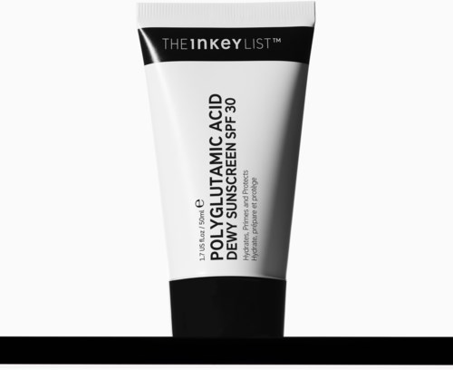 A white tube of skincare product labelled with ingredients like polyglutamic acid and sunscreen SPF 30.