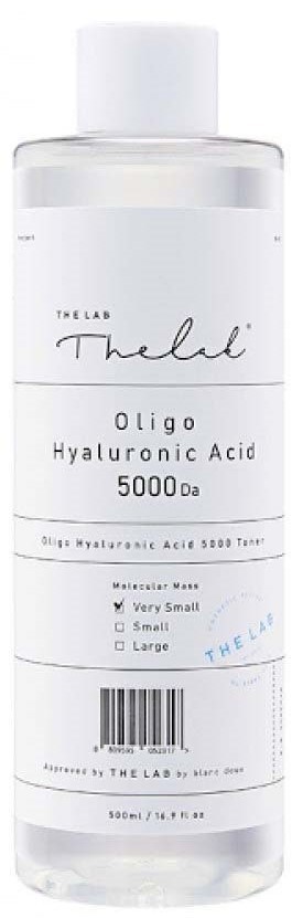 A clear bottle labeled The Lab Thali, containing hyaluronic acid with 5000 Da, indicating it is a skincare product.