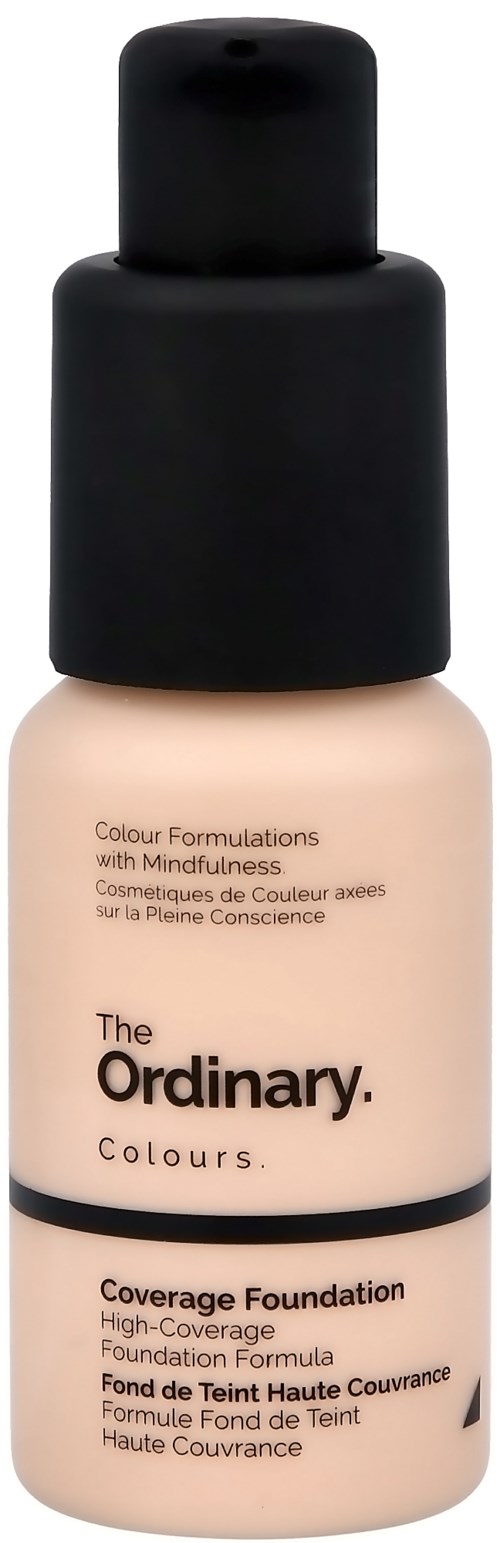 En flaska The Ordinary Coverage Foundation i ljus nyans med svart lock.