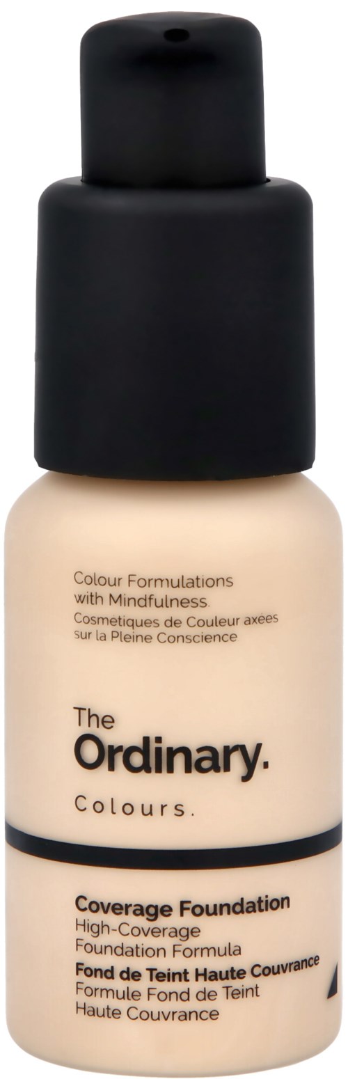 En beige foundationflaska med svart pump och lock. Den är märkt "The Ordinary Colours" för hög täckning.