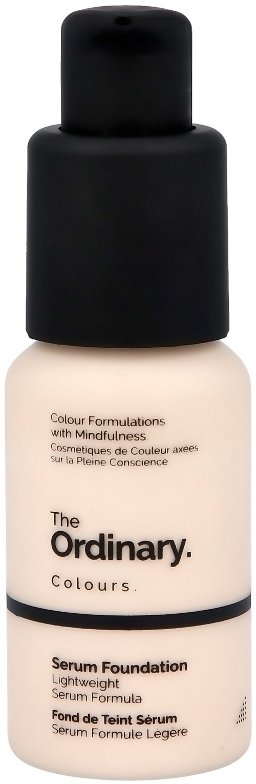 En liten flaska med svart lock, märkt 'The Ordinary Serum Foundation' i ljus färgad vätska.