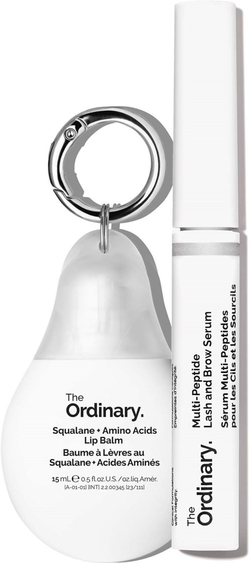 A small white bottle and a white pen-like container, both labeled The Ordinary skincare products.