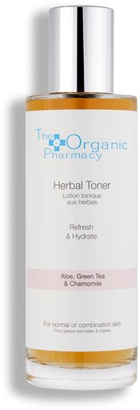 En klar flaska med silverlock, märkt 'Herbal Toner' för att friska upp och återfukta huden med aloe, grönt te och kamomill.